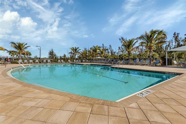 view of swimming pool featuring a patio area