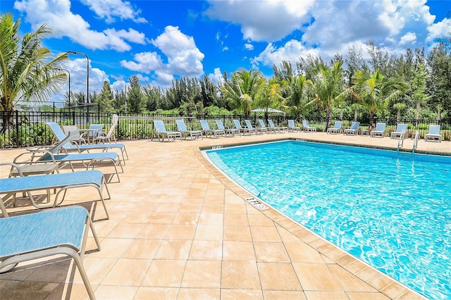 view of swimming pool featuring a patio