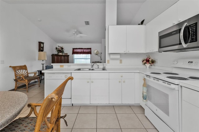 kitchen with lofted ceiling, sink, white cabinets, white appliances, and ceiling fan