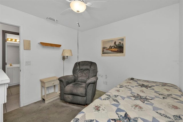 bedroom featuring ensuite bathroom and ceiling fan