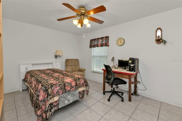 bedroom with ceiling fan and light tile patterned flooring