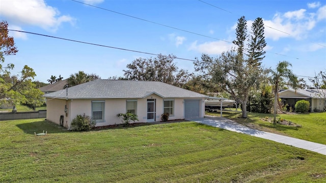 single story home with a front yard and a garage