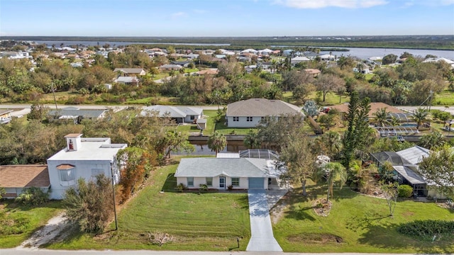 drone / aerial view with a water view