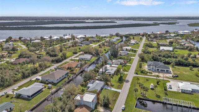 bird's eye view with a water view