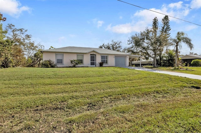 single story home with a garage and a front lawn