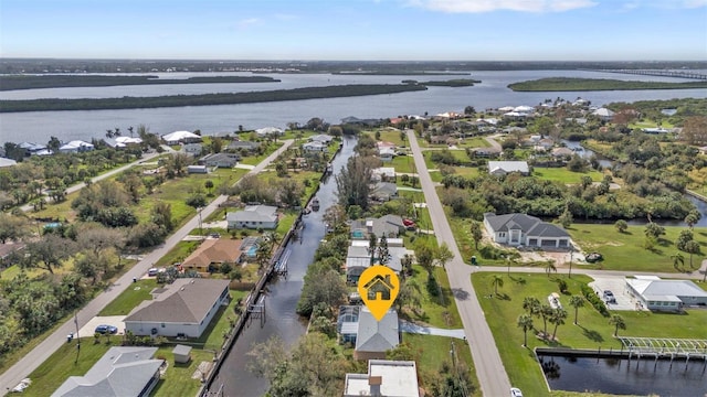 drone / aerial view featuring a water view