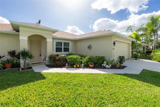 single story home featuring a front yard and a garage