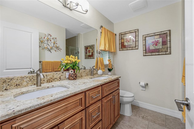 bathroom featuring an enclosed shower, vanity, toilet, and tile patterned flooring