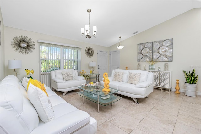 tiled living room featuring a notable chandelier and vaulted ceiling