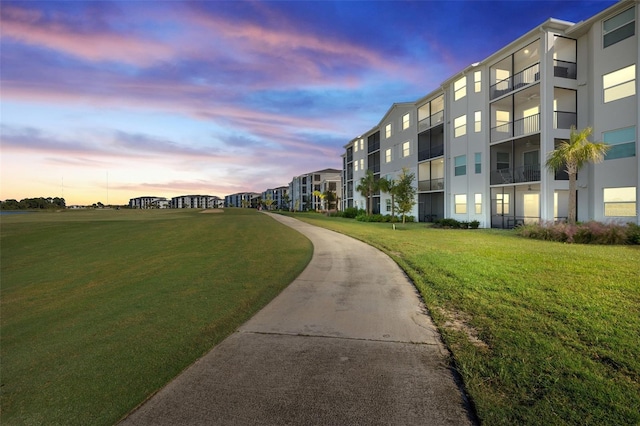 surrounding community featuring a lawn