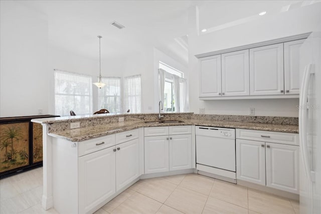 kitchen featuring white cabinetry, white dishwasher, sink, and pendant lighting