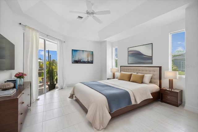 bedroom featuring a ceiling fan, visible vents, access to exterior, and light tile patterned floors