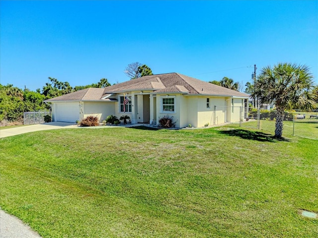 ranch-style home featuring concrete driveway, a garage, fence, and stucco siding