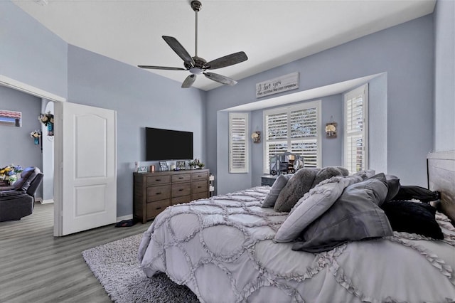 bedroom featuring light hardwood / wood-style flooring and ceiling fan