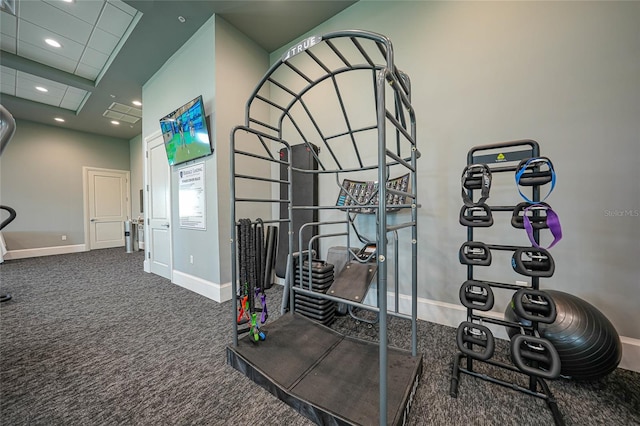 exercise room featuring carpet