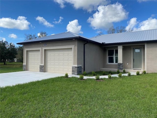 view of front facade with a garage and a front lawn