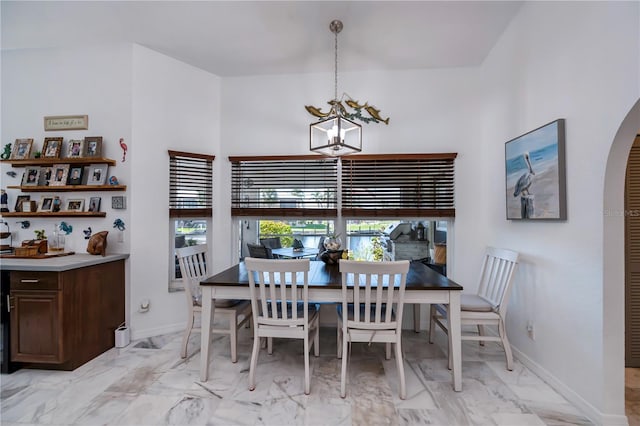 dining room featuring a chandelier