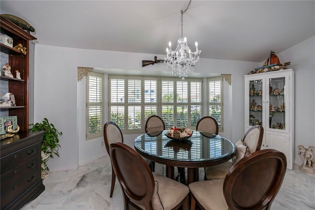 dining room featuring ceiling fan with notable chandelier