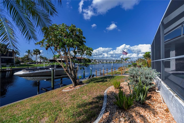 property view of water featuring a boat dock