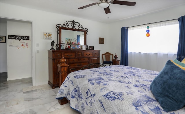 bedroom with baseboards, marble finish floor, and ceiling fan