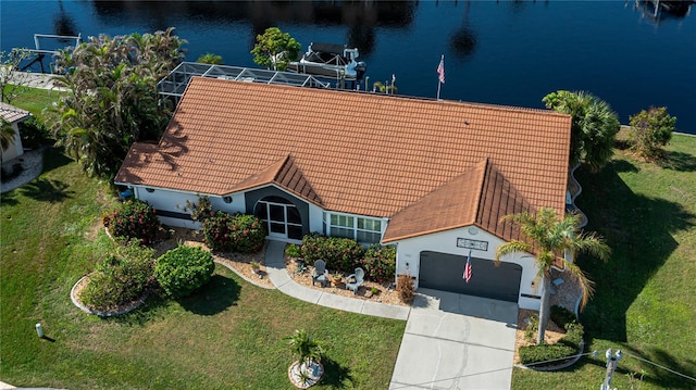 drone / aerial view featuring a water view