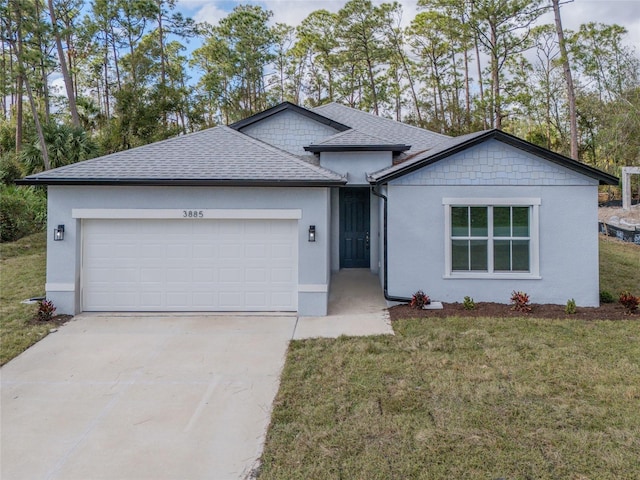 single story home featuring a garage and a front lawn