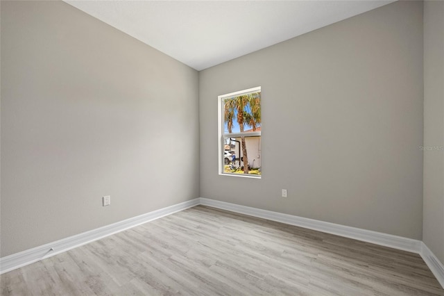 3883 Dominic St, North Port, FL 34288 - empty room with baseboards and light wood-style floors