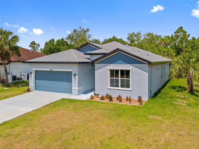 3883 Dominic St, North Port, FL 34288 - single story home with a front lawn, cooling unit, stucco siding, an attached garage, and driveway