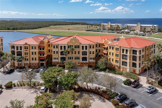 bird's eye view with a water view