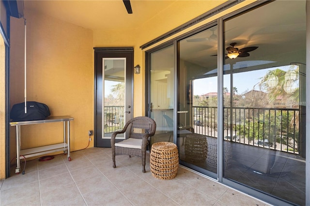 exterior space featuring ceiling fan