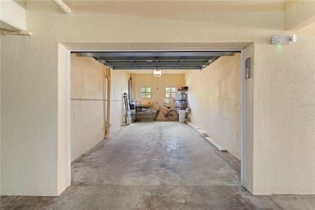 hall featuring concrete floors