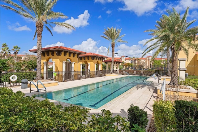 view of swimming pool featuring a patio