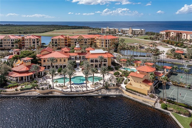 birds eye view of property featuring a water view