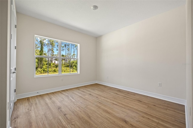 3779 Clearfield St, North Port, FL 34286 - spare room with baseboards and light wood-style flooring