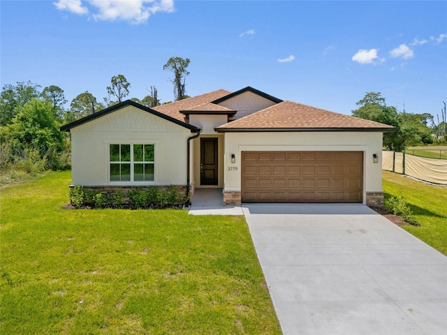 3779 Clearfield St, North Port, FL 34286 - ranch-style home with a garage, a front lawn, roof with shingles, and driveway