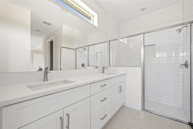 3779 Clearfield St, North Port, FL 34286 - bathroom featuring visible vents, a shower stall, and a sink