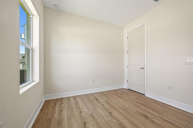 3779 Clearfield St, North Port, FL 34286 - spare room with baseboards and light wood finished floors