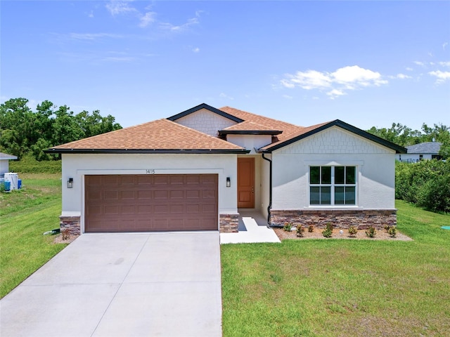 1415 Nackman Rd, North Port, FL 34288 - view of front facade featuring stone siding, an attached garage, driveway, and a front yard