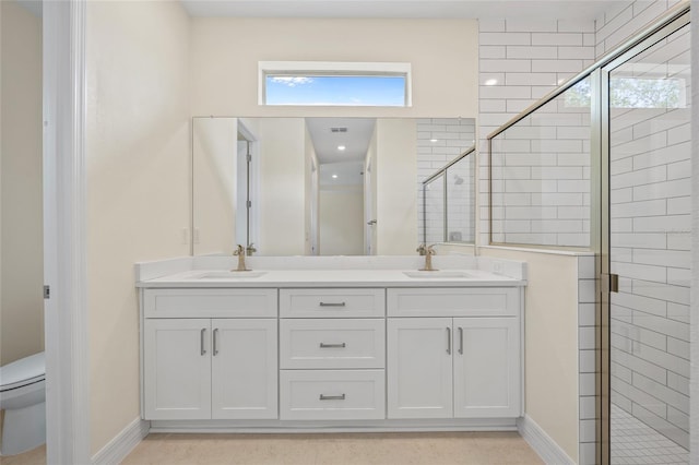 1415 Nackman Rd, North Port, FL 34288 - full bath with toilet, a stall shower, double vanity, and baseboards