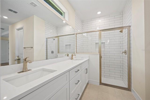 1415 Nackman Rd, North Port, FL 34288 - full bath featuring double vanity, a shower stall, tile patterned flooring, baseboards, and recessed lighting