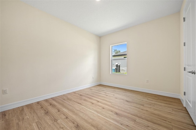1415 Nackman Rd, North Port, FL 34288 - spare room featuring baseboards and light wood-style floors