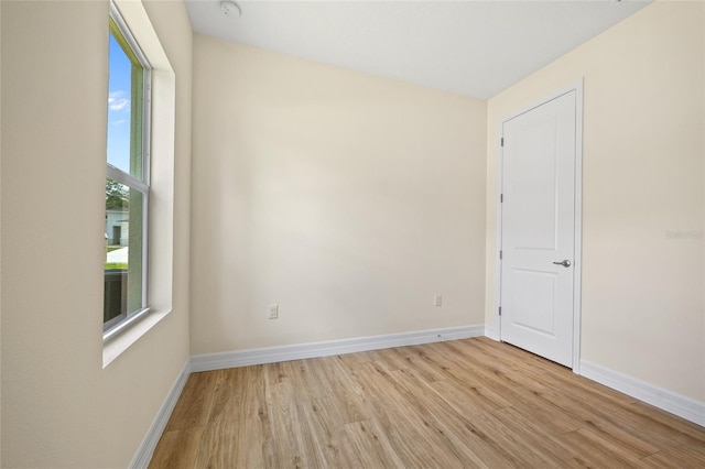 1415 Nackman Rd, North Port, FL 34288 - unfurnished room with wood finished floors and baseboards