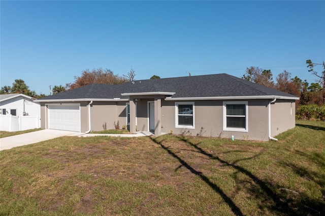 ranch-style house with a front lawn and a garage