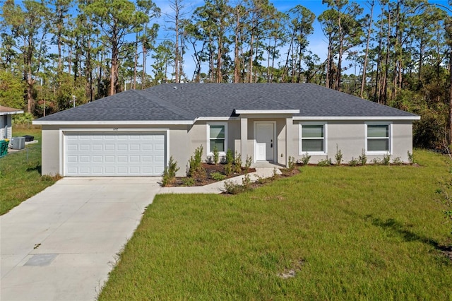 single story home featuring central AC, a front yard, and a garage