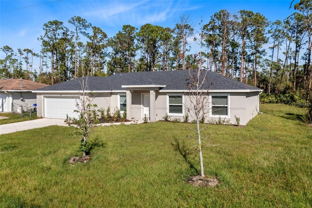 ranch-style house featuring a garage and a front lawn