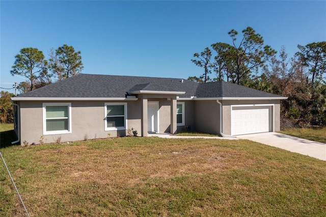 single story home featuring a garage and a front yard