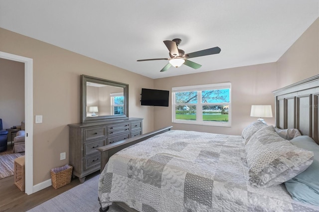 bedroom featuring ceiling fan and hardwood / wood-style flooring