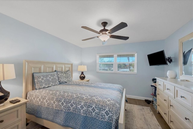 bedroom with ceiling fan and light hardwood / wood-style flooring