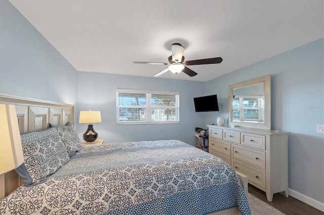 bedroom with ceiling fan and light wood-type flooring