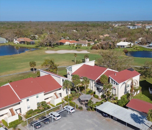 drone / aerial view with a water view